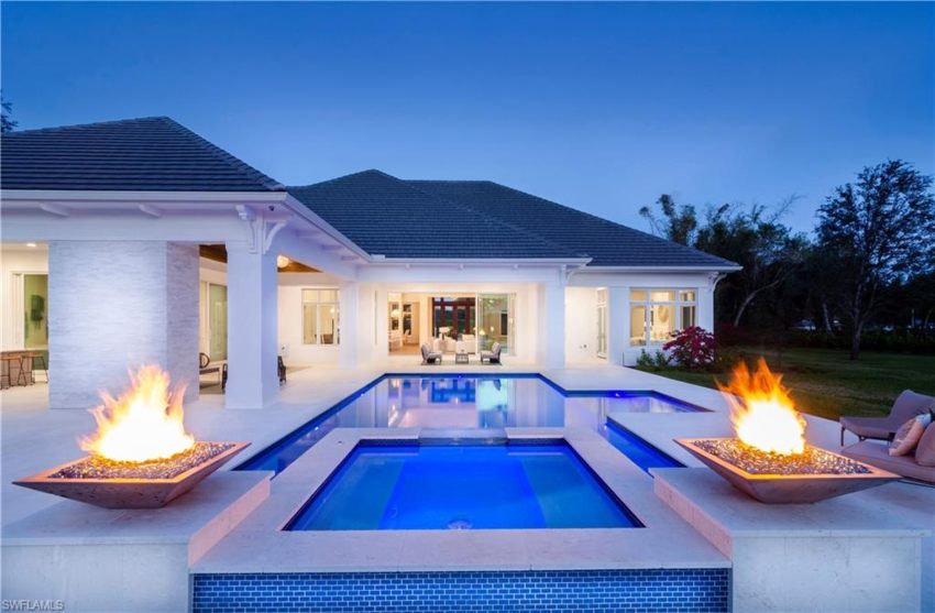 Modern Florida home with outdoor firepits pool and hot tub